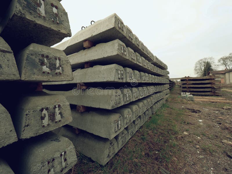 Sleepers stock in railway depot. New concrete railway ties stored for reconstruction of old railway station. stock images Sleepers stock in railway depot. New concrete railway ties stored for reconstruction of old railway station. stock images