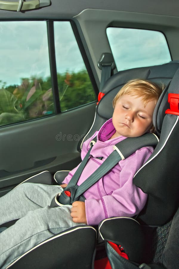 Sleeping child in car seat stock photo. Image of save 15466976
