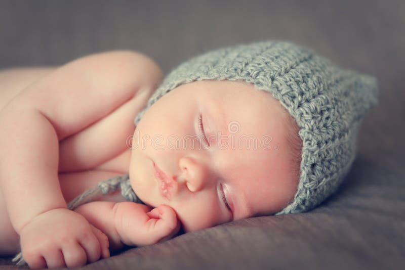 Little Baby Boy with a Big Hat Stock Photo Image of hand