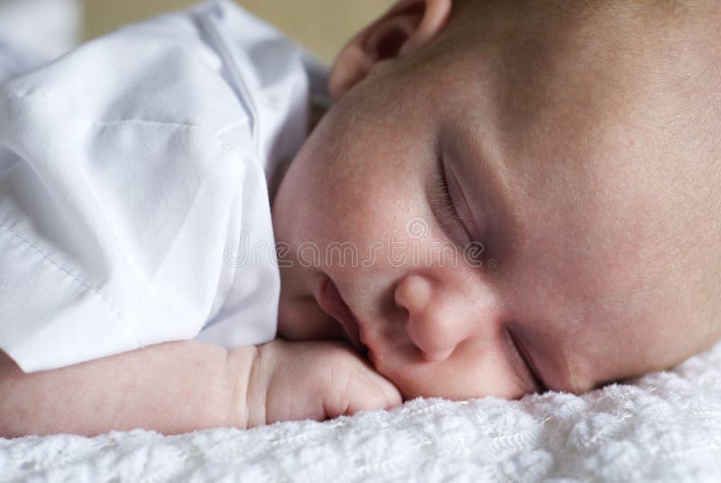 Newborn baby girl sleeping stock image. Image of side 13399025