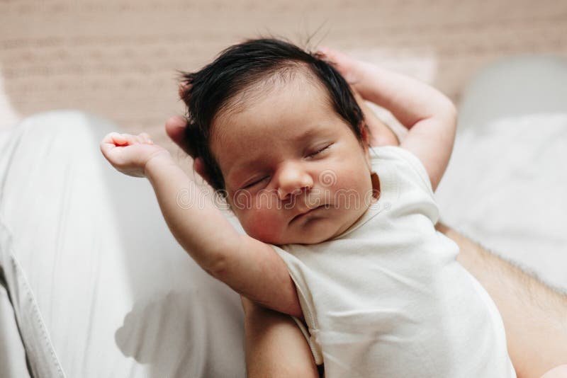 Sleeping Newborn Baby on Father Hands. Baby with Dark Hair Stock Image - Image of close, newborn: 158253587 Sleeping Newborn Baby on Father Hands. Baby with Dark Hair Stock Image - Image of close, newborn: 158253587