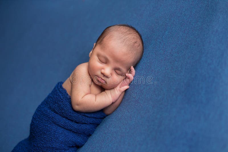 Swaddled, Sleeping Newborn Baby Boy stock photography Swaddled, Sleeping Newborn Baby Boy stock photography