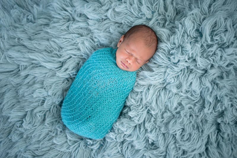 Swaddled, Sleeping, Newborn Baby Boy stock images Swaddled, Sleeping, Newborn Baby Boy stock images