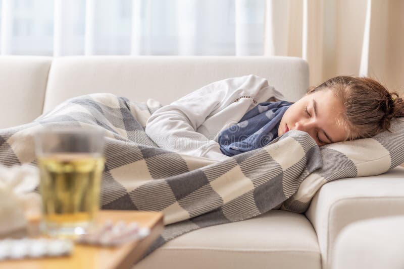 Sleeping Young Sick Girl with Cold and High Fever Lying on a Sofa Stock Image Image of fever