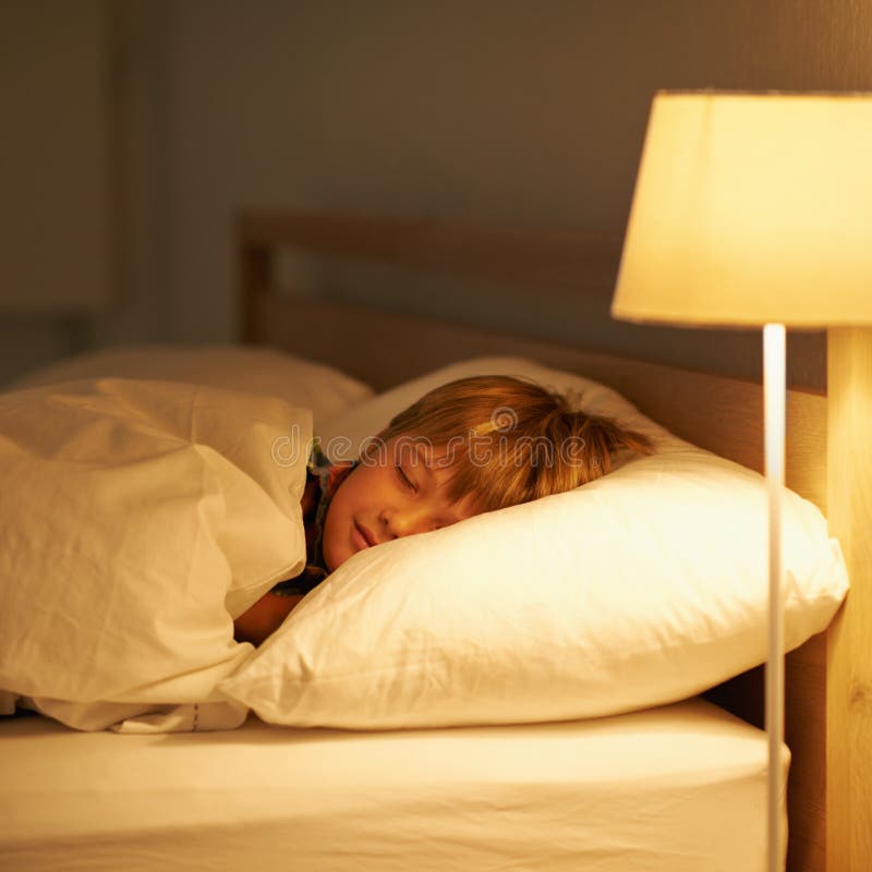 He Always Sleeps So Peacefully Shot Of A Young Boy Sleeping In Bed