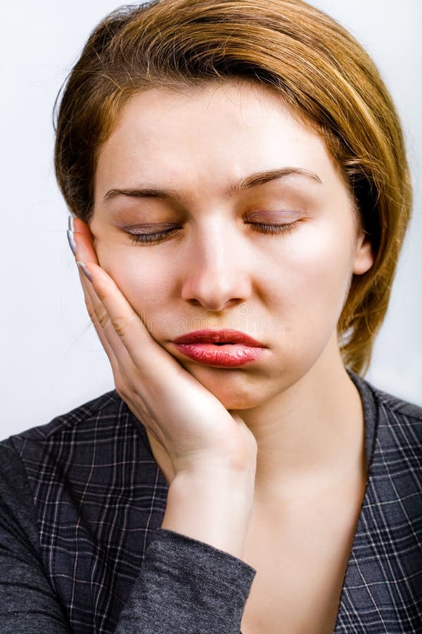 Portrait of sleepy woman looking very bored and tired