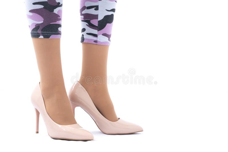 Slender Female Legs Elegant Lacquered Beige Shoes With High Heels Leggings In Camouflage Stock