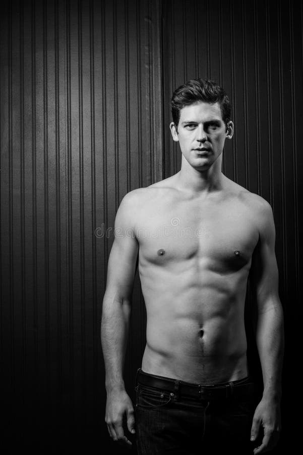 Slender Male Washboard Abs stock photo. Image of provocative 48179828