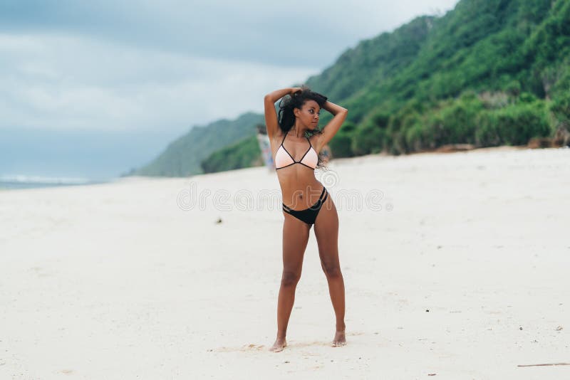 Hot Slim Herons Xxx Videos - Slender Dark Skinned Girl in Swimwear Posing on Beach with Sand. Afro  American Woman Resting on Paradise Island Stock Photo - Image of leisure,  model: 141530242
