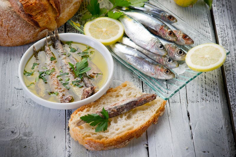 Slice bread with anchovy stock image