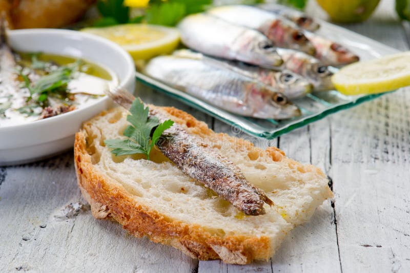 Slice bread with anchovy royalty free stock photography