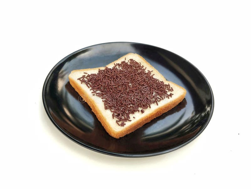 Slice bread with chocolate on top on plate isolated on white background stock images
