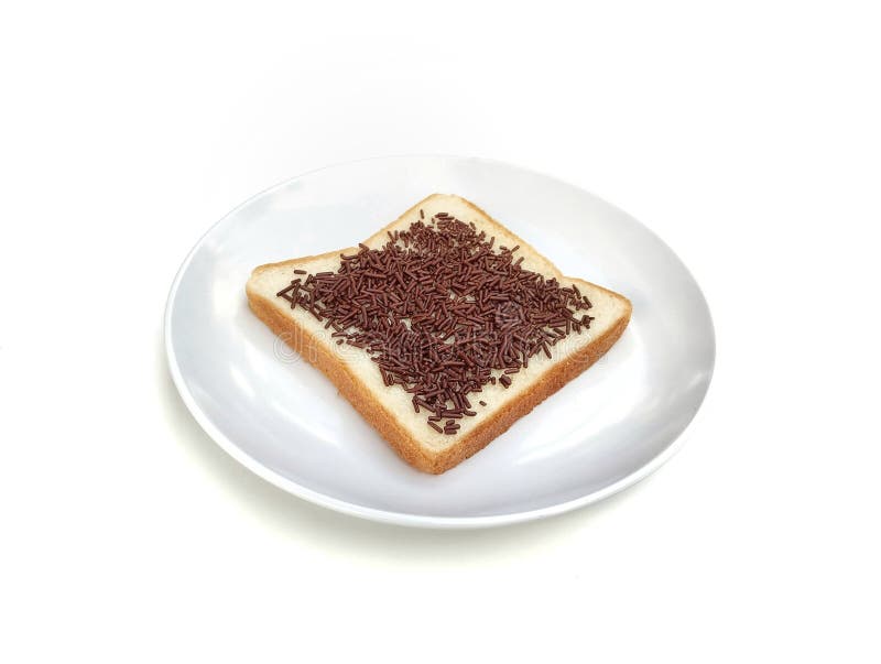 Slice bread with chocolate on top on plate isolated on white background stock image