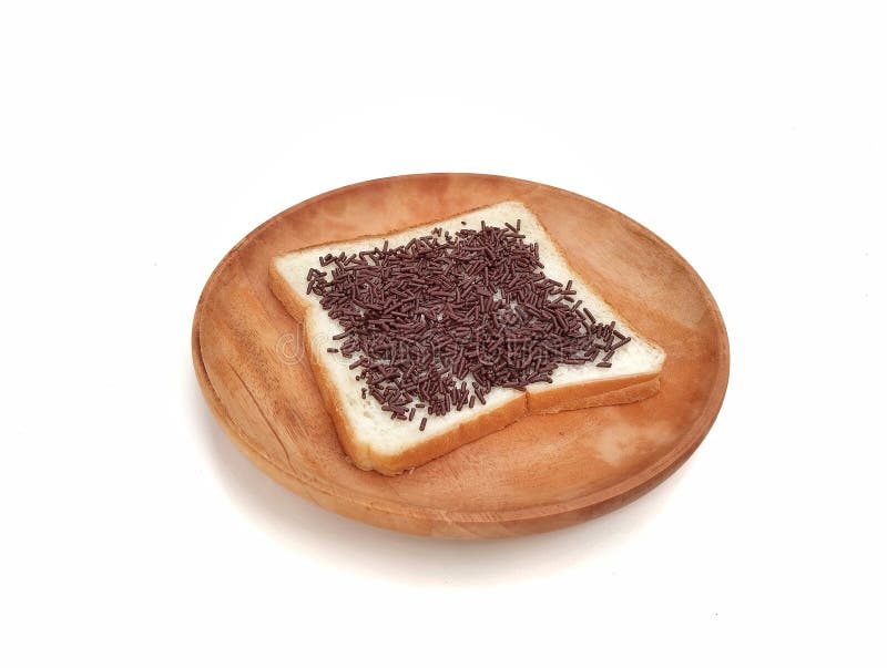 Slice bread with chocolate on top on plate isolated on white background royalty free stock photography