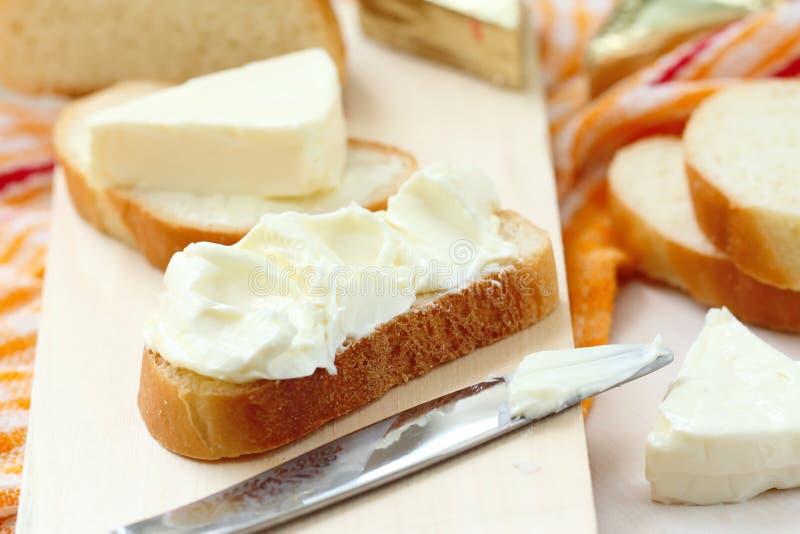 Slice of Bread with Cream Cheese and Butter for Breakfast Stock Image