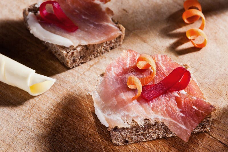 Slice bread with ham and paprika stock image