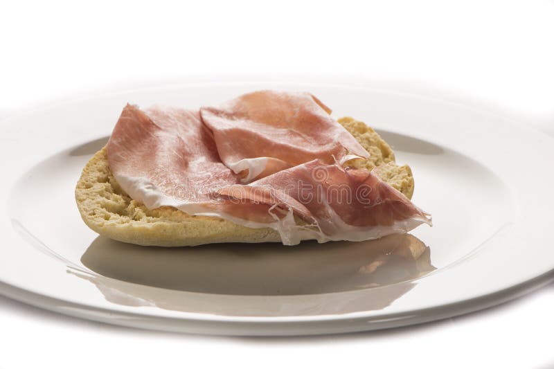 Slice bread with parma ham royalty free stock images