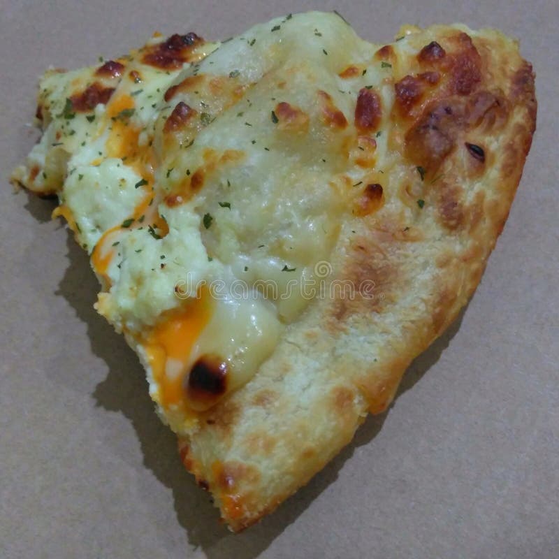 A slice of cheese pizza stock photo. Image of slice 268185760