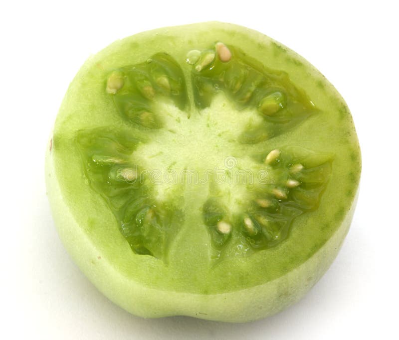 Slice of green tomatoe royalty free stock photography Slice of green tomatoe royalty free stock photography