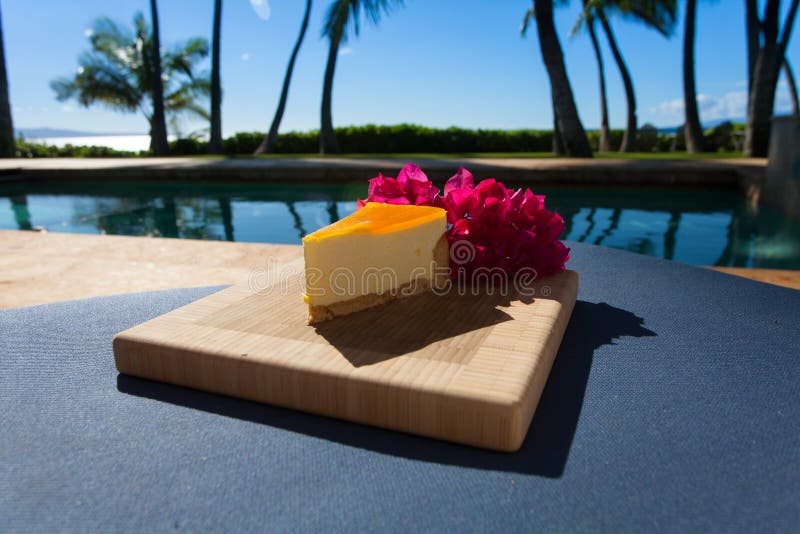 Slice of Lilikoi Cheesecake on a Beautiful Hawaiian Day Stock Image