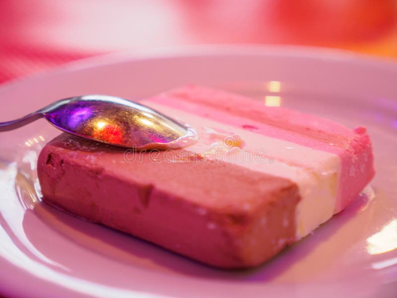 Slice of Neapolitan ice cream, Paris, France royalty free stock photography Slice of Neapolitan ice cream, Paris, France royalty free stock photography