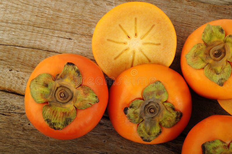 Slice persimmon fruit stock photo. Image of healthy, sweet 62618998