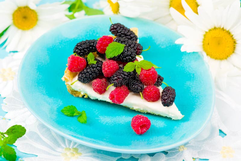 Slice of a tart with fresh berries stock photo Slice of a tart with fresh berries stock photo