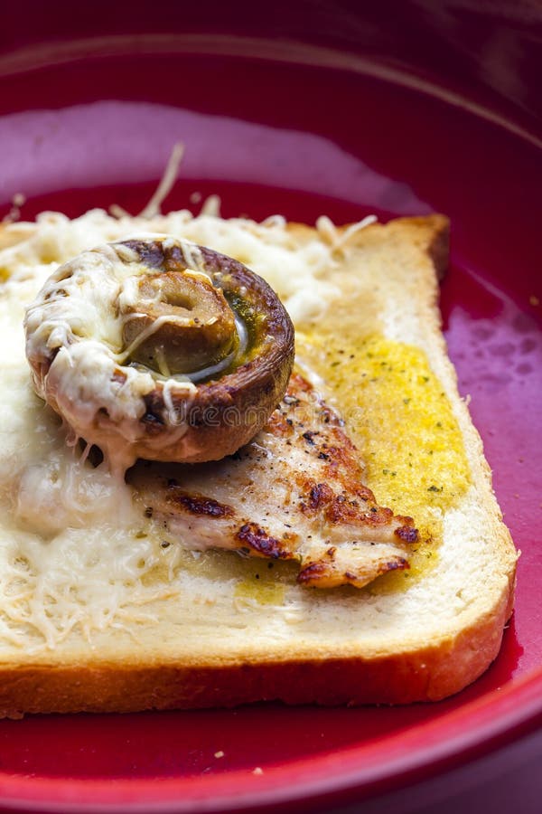 Slice of Toast Bread Grilled with Meat, Champignon and Cheese Stock
