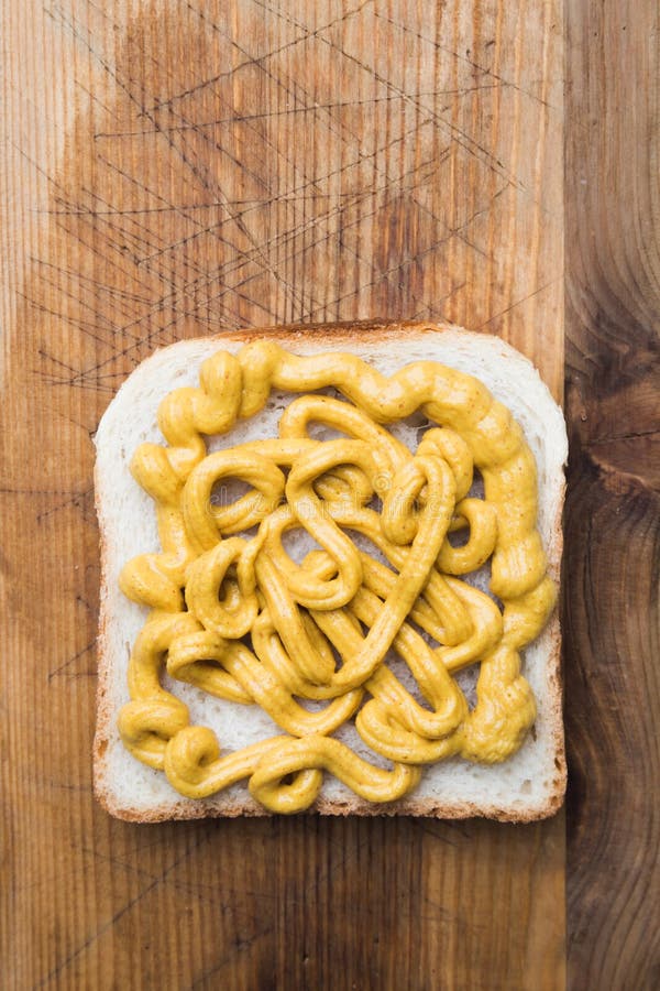 Slice of Toast Bread with Mustard Spread Stock Photo Image of school