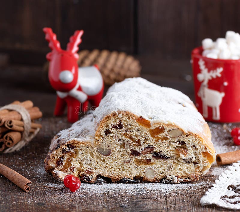 Slice Traditional European Cake Stollen with Nuts and Candied Fruit