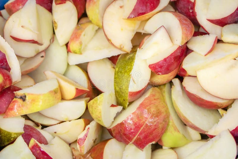Sliced of Apple. Chopped Apples are Ready for Further Processing Stock