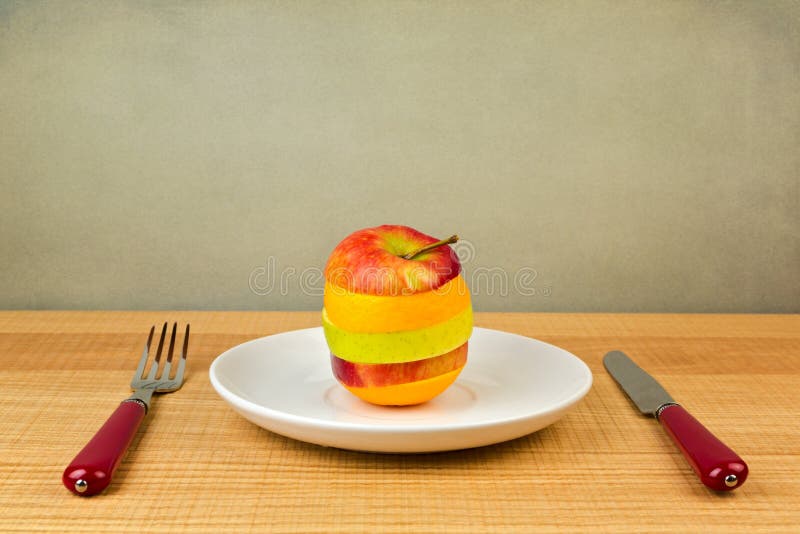 Sliced Apple and Orange on Plate. Healthy Diet Concept Stock Image ...