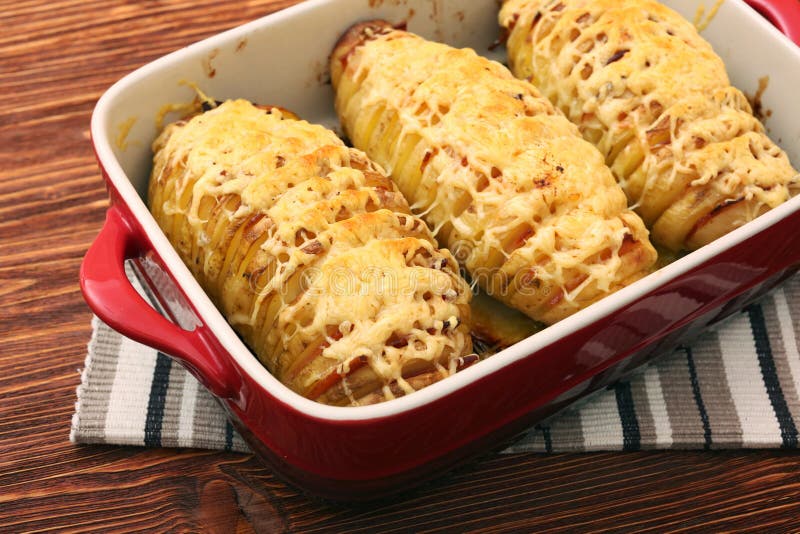 Sliced Baked Potatoes with Cheese and Bacon Stock Image - Image of diet
