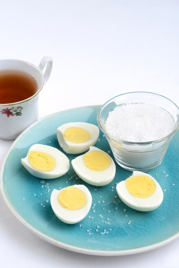 Sliced Boiled Eggs with Salt Stock Photo Image of herb, appetizer