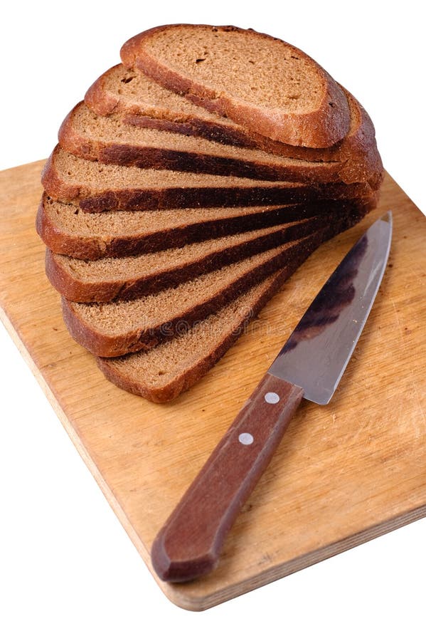 Sliced bread on a wooden cutting board and knife