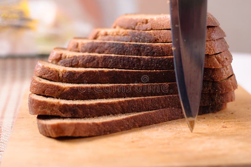 Sliced Bread on a Wooden Cutting Board Stock Photo Image of object