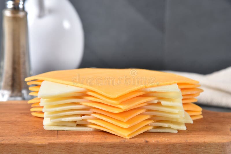 Sliced Cheddar and Swiss Cheese Stock Photo Image of cheese, closeup