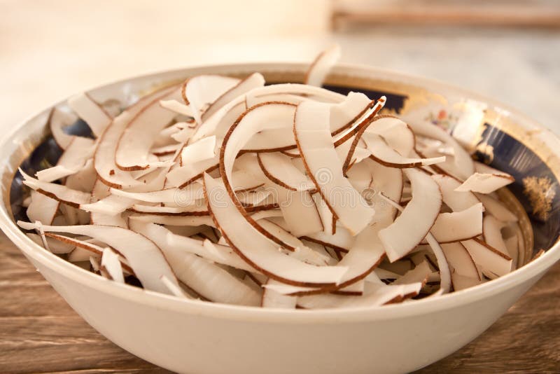 Sliced coconut , prepare for thai desert