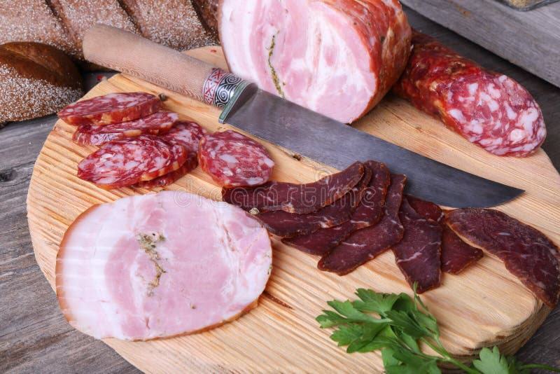 Sliced Cold Meats on a Cutting Board Stock Photo Image of chili, knife 48168724