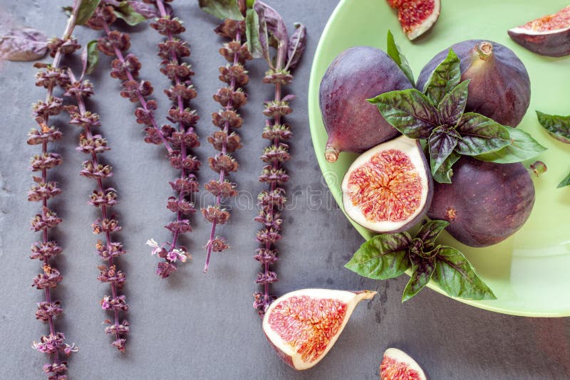 Sliced figs with basil stock images Sliced figs with basil stock images
