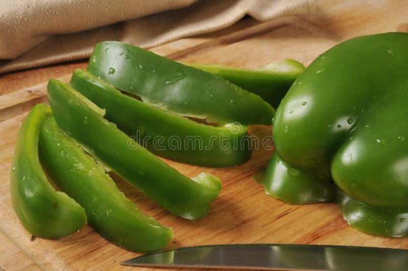 Sliced green bell peppers stock photo. Image of nutritious 39115332