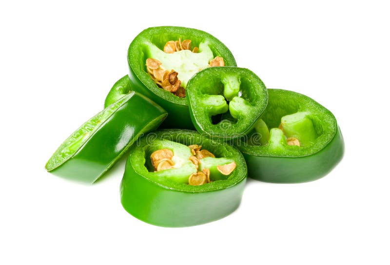 Sliced jalapeno peppers isolated on white background. Green chili pepper. Capsicum annuum