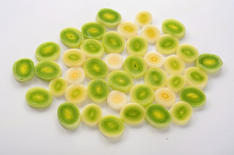 Sliced leek rings closeup on white background royalty free stock images