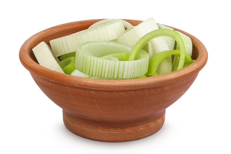 Sliced Leek vegetable in ceramic bowl isolated on white background with full depth of field stock photo