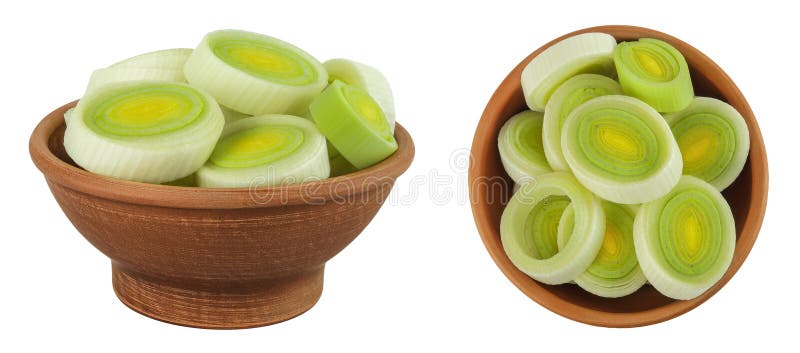 Sliced Leek vegetable in ceramic bowl isolated on white background with full depth of field royalty free stock photos