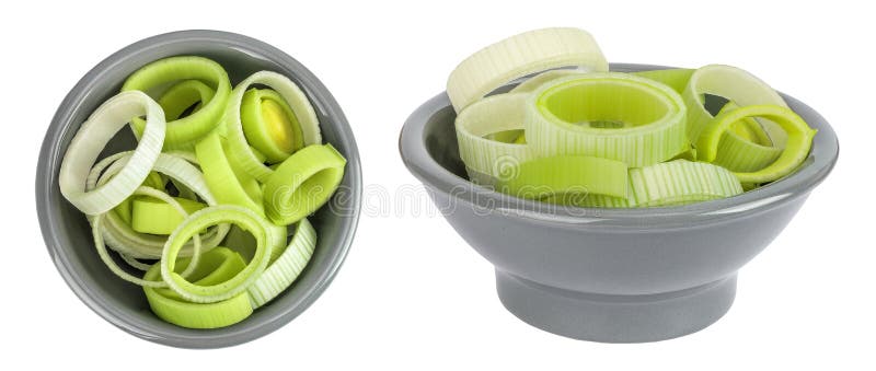 Sliced Leek vegetable in ceramic bowl isolated on white background. Top view. Flat lay royalty free stock photography