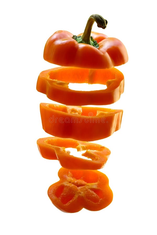 Sliced orange pepper on white background