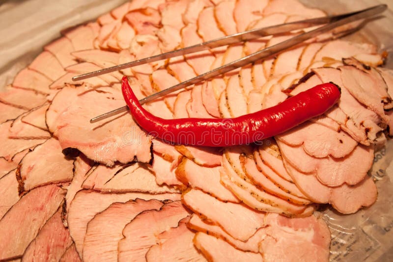 Sliced Parma Ham Boiled Pork with Hot Red Chilly Pepper Stock Image