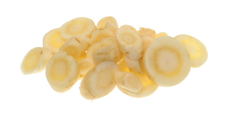 Slices of parsnip on a white background royalty free stock photos