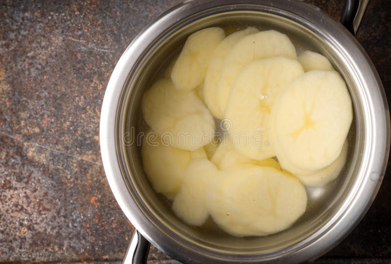 Sliced Potatoes in the Metal Pot with Water Stock Photo Image of